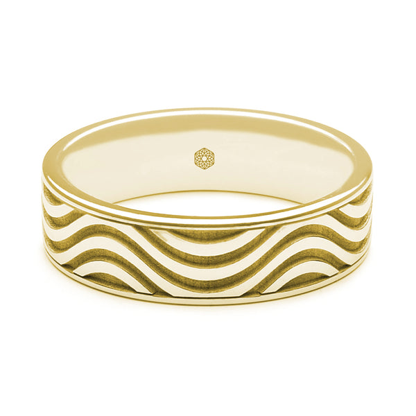 Horizontal Shot of Mens 9ct Yellow Gold Flat Court Shape Wedding Ring With Multi-Wave pattern