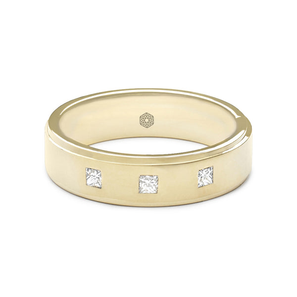 Horizontal shot of Mens Matte Finished Flat Court Wedding Ring Featuring Polished Stepped Edges and Three Princess Cut Diamonds