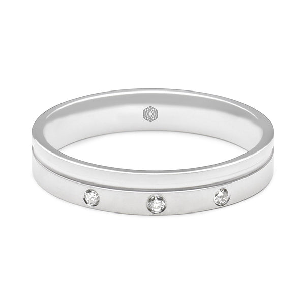Horizontal shot of Mens Flat Court Wedding Ring With a Satin Finished Surface Featuring an Offset Groove and Three Round Brilliant Cut Diamonds