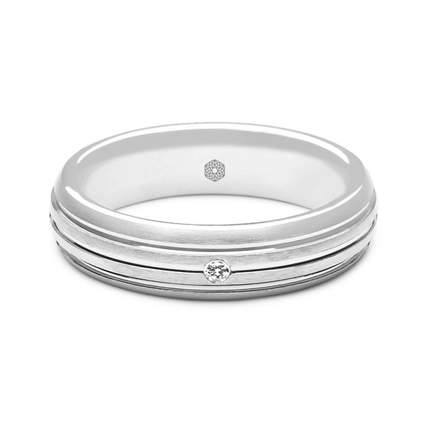 Horizontal shot of Mens Wedding Ring With Triple Line Pattern and Single Round Brilliant Cut Diamond