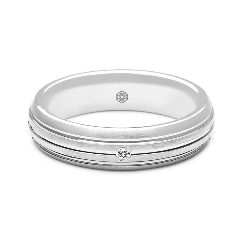 Horizontal shot of Mens Wedding Ring With Triple Line Pattern and Single Round Brilliant Cut Diamond