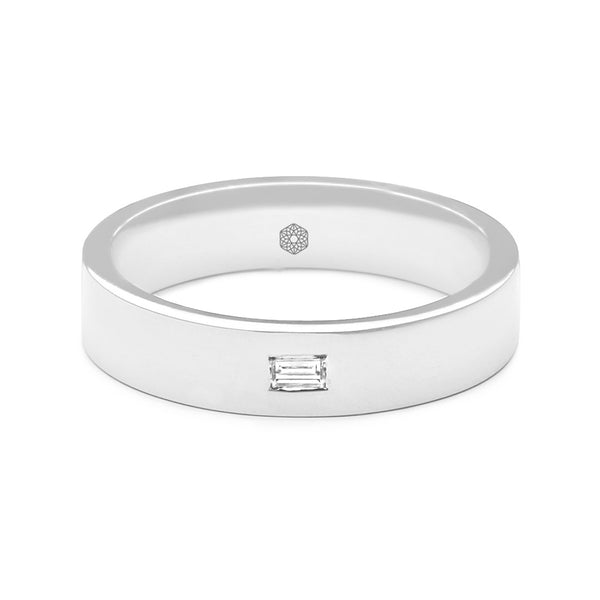 Horizontal shot of Highly Polished Mens Flat Court Wedding Ring With a Single Baguette Cut Diamond