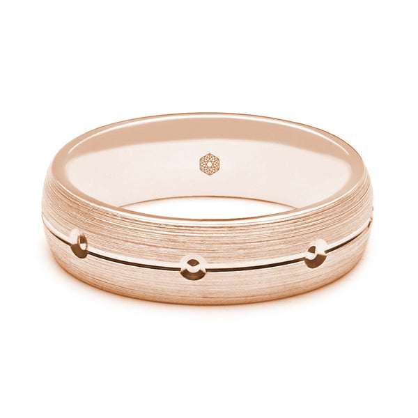 Horizontal Shot of Mens Matte Finish 9ct Rose Gold Court Shape Wedding Ring With Central Groove and Diamond Cut Details