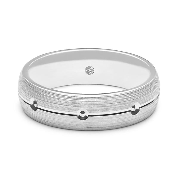 Horizontal Shot of Mens Matte Finish 18 ct White Gold Court Shape Wedding Ring With Central Groove and Diamond Cut Details