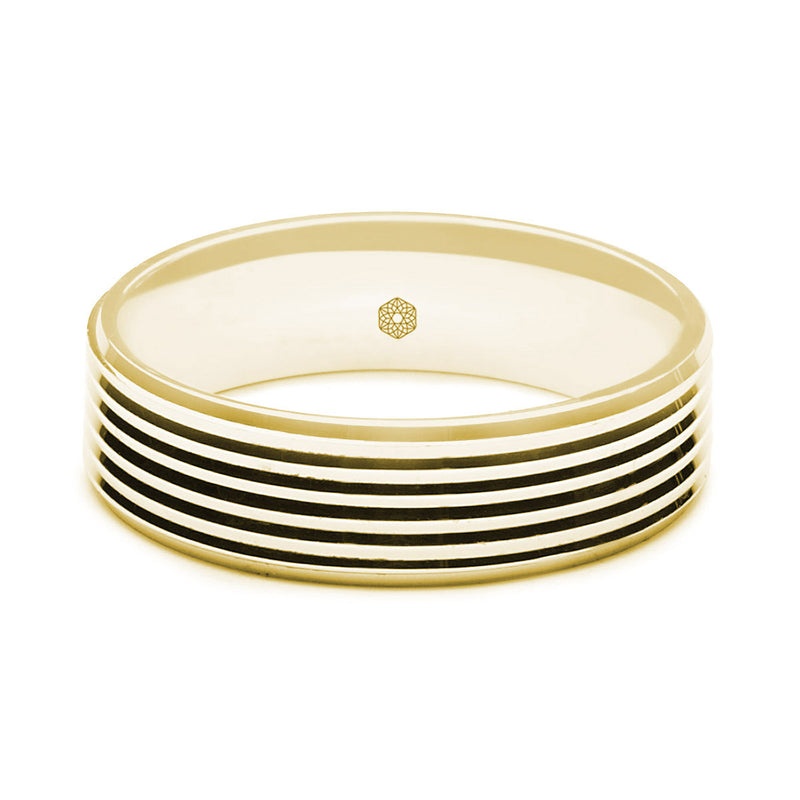 Horizontal Shot of Mens Polished 9ct Yellow Gold Flat Court Shape Wedding Ring with Millgrain Edges and Groove Pattern