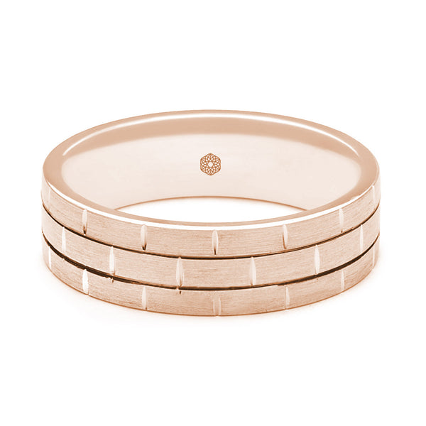 Horizontal Shot of Mens Satin Finish 9ct Rose Gold Flat Court Shape Wedding Ring With Brickwork Pattern