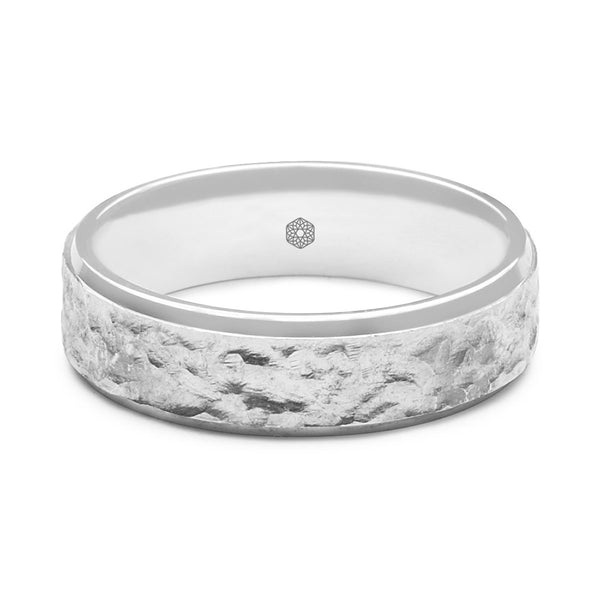 Horizontal Shot of Mens 9ct White Gold Flat Court Shape Wedding Ring With a Hammered Finish Bordered by Polished Edges